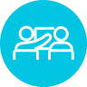 White line icon of two people facing each other with one placing a hand on the other's shoulder on a turquoise circular background.